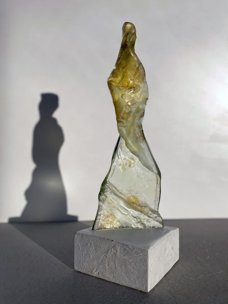 Glass sculptures in yellow and transparent