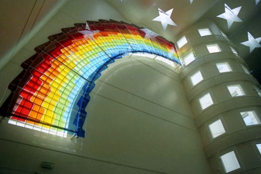 Artistic glass rainbow by Archiglass, Tomasz Urbanowicz at the College George Brassens in Paris, France. All rights reserved.
